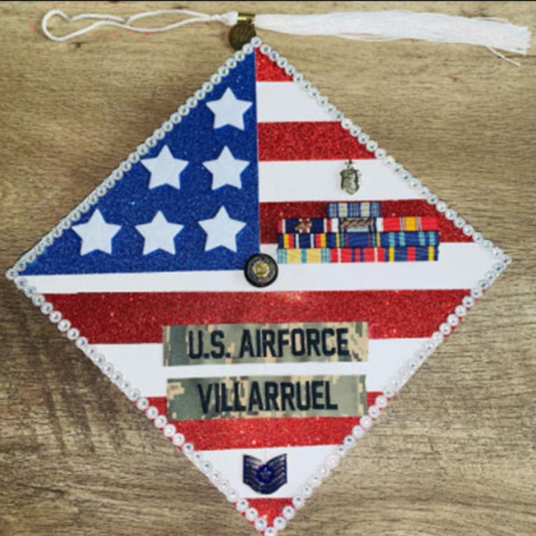 A stars-and-stripes-themed mortarboard, decorated by a U.S. Air Force member and IU graduate